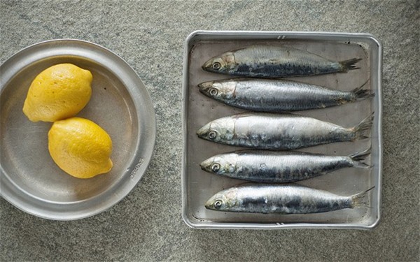 Baked sardines with chermoula and lemon and pistachio couscous