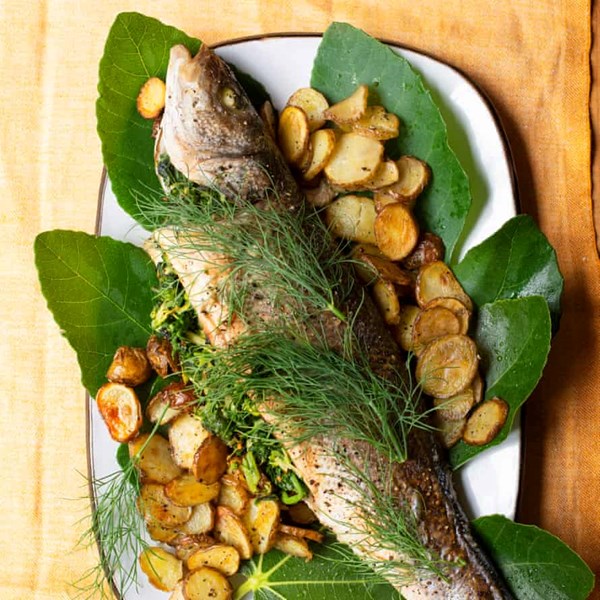 Baked sea bass, courgette and spinach stuffing