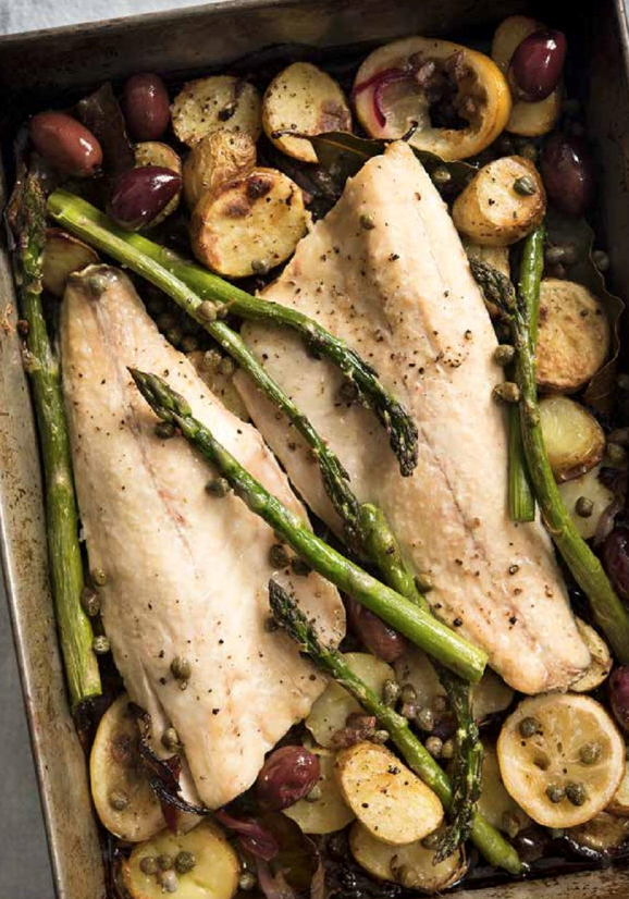 Baked sea bass with potatoes, anchovies and lemon