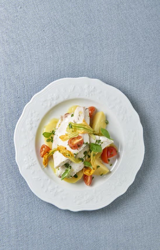 Baked sea bass with vegetables and parsley mayonnaise