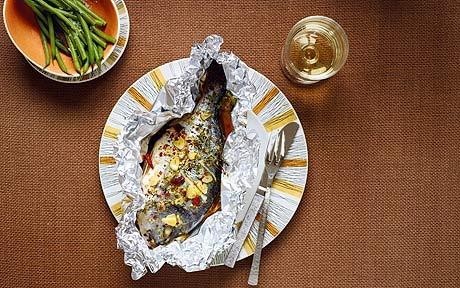 Baked sea bream with thyme, chilli and garlic