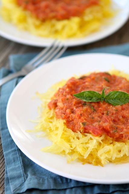 Baked spaghetti squash with creamy roasted red pepper sauce