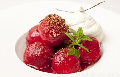 Baked spiced plums with cream Chantilly