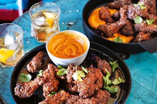 Baked spicy chicken drumettes with romesco