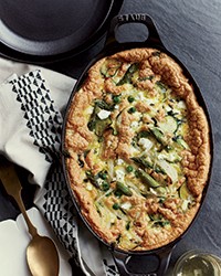 Baked spring vegetable omelet with goat cheese and mint