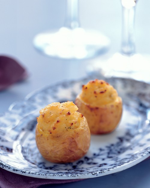 Baked stuffed potatoes with roasted garlic