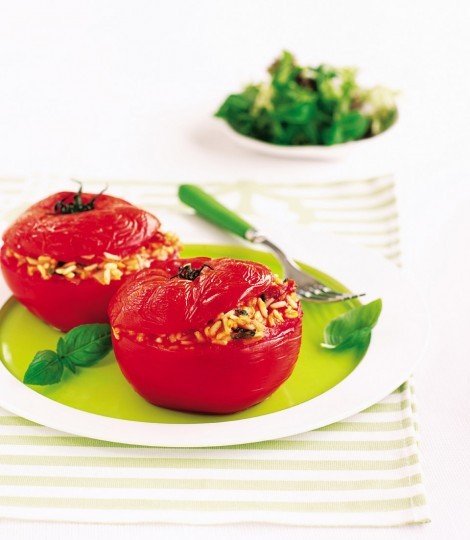 Baked stuffed tomatoes filled with lemon, basil and Parmesan rice
