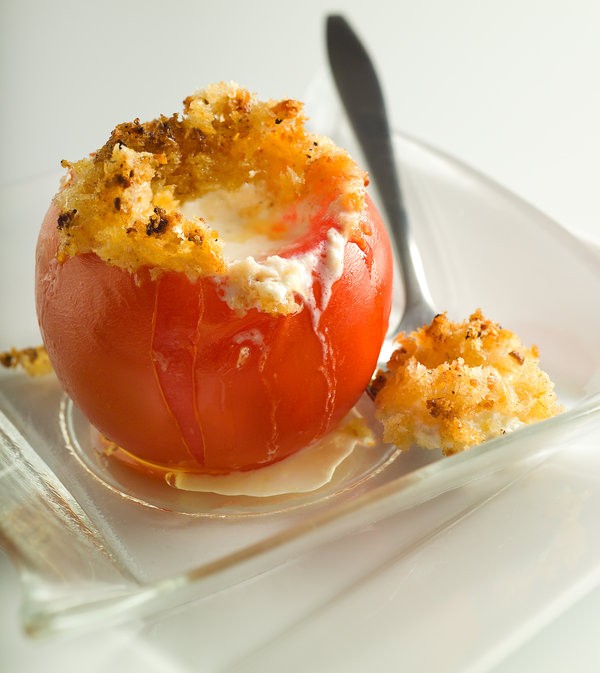 Baked stuffed tomatoes with goat cheese fondue