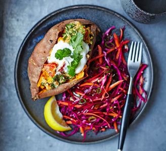Baked sweet potatoes with lentils & red cabbage slaw
