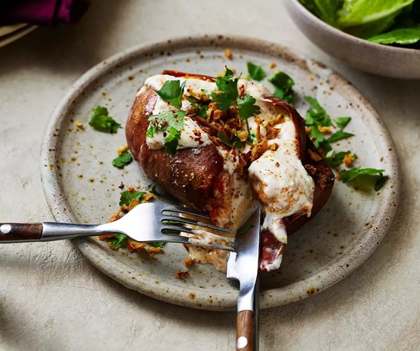 Baked sweet potatoes with spiced lime cream