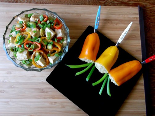 Baked tofu, pickled edamame, and mini peppers appetizer