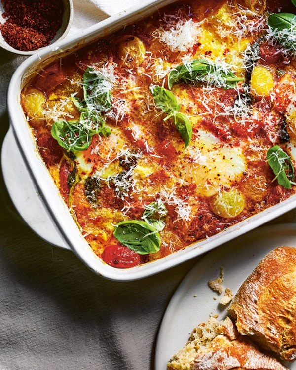 Baked tomatoes and eggs with basil, chilli and Parmesan