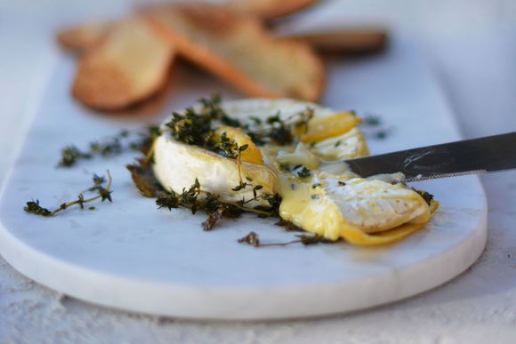 Baked triple cream Brie with thyme and lemon
