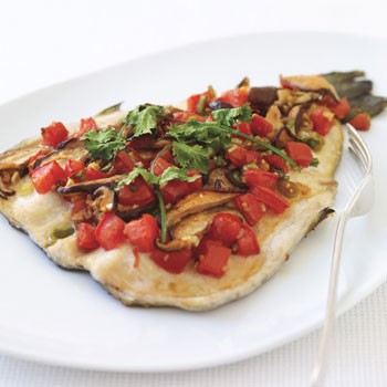 Baked trout with shiitake mushrooms, tomatoes, and ginger