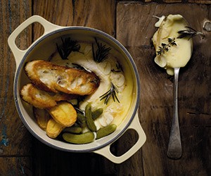 Baked vacherin, new potatoes, toast and cornichons
