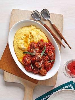 Baked veal and sage meatballs with soft polenta