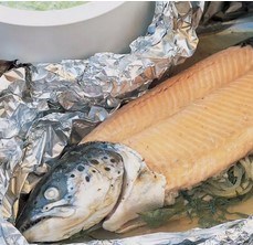 Baked whole salmon with sauce verte