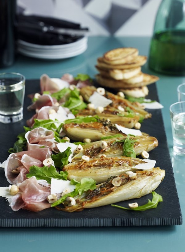 Baked witlof with orange and hazelnuts