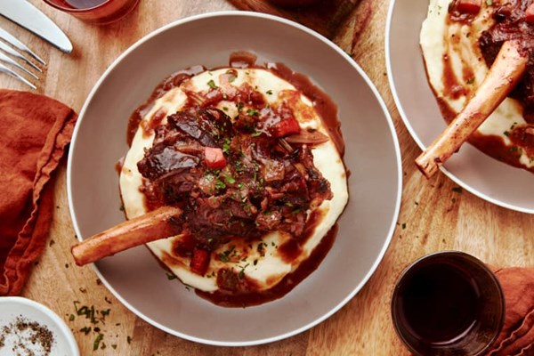 Balsamic and citrus-braised lamb shanks with whipped parsnip purée