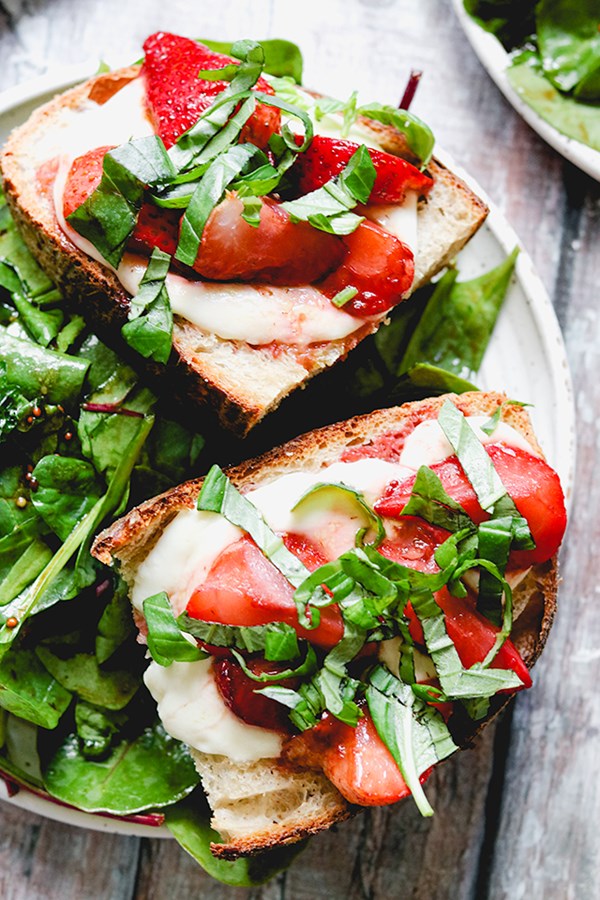 Balsamic roasted strawberry, basil, and mozzarella Caprese toasts