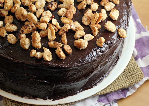 Banana cake with mocha frosting and salted candied peanuts