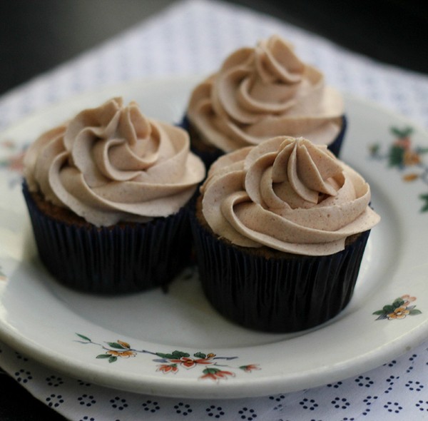 Banana chocolate chip cupcakes with bourbon cinnamon buttercream