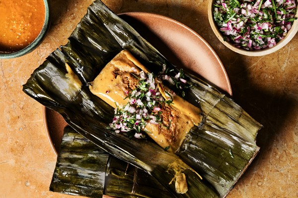 Banana leaf-wrapped lamb shank tamales with morita chile salsa