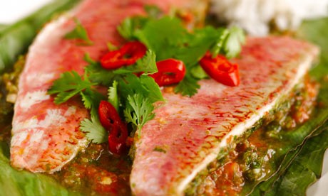 Banana-leaf-wrapped red mullet with tomato and chilli