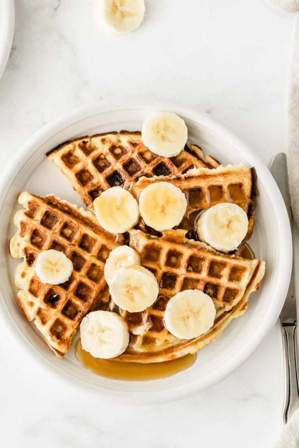 Banana sour cream waffles [maple-honey syrup]
