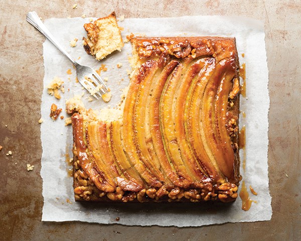 Banana upside-down cake with walnuts and coconut