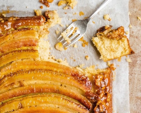 Banana upside-down cake with walnuts and coconut