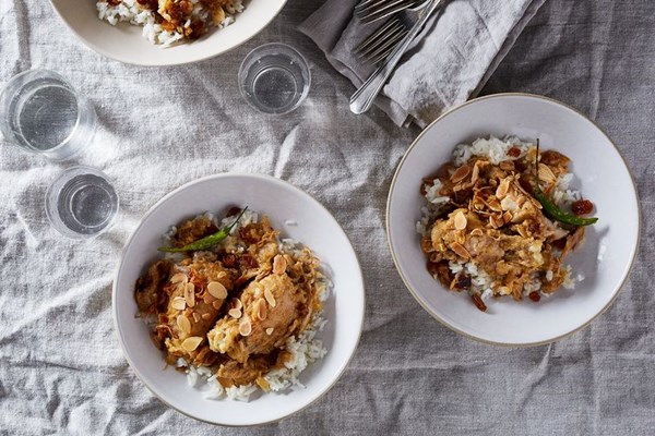 Bangladeshi style creamy chicken korma with cardamom, crispy shallots, almonds & golden raisins