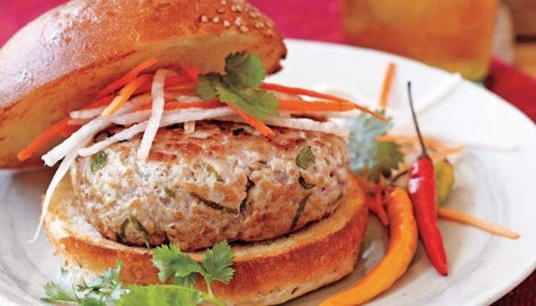 Banh mi pork burgers with cucumber, carrots, and cilantro