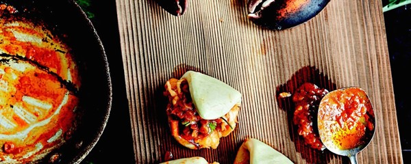 Bao-ed lobster in warm chile butter