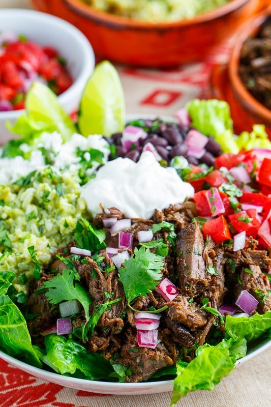 Barbacoa and avocado cilantro lime rice burrito salad bowl
