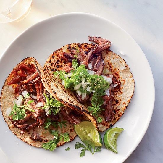 Barbacoa beef tacos with two sauces [Roberto Santibañez]