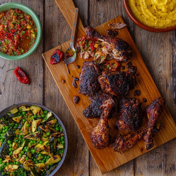 Barbecue jerk chicken, burnt Scotch bonnet salsa, wet polenta, salad of peas, courgettes, parsley