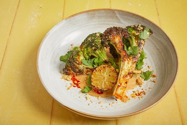  Barbecued broccoli with satay sauce, charred lime, smoked peanut, coriander
