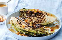 Barbecued cabbage with macadamias and chicken fat and fennel sauce