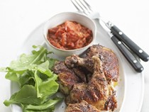 Barbecued Cajun chickens with spicy tomato salsa