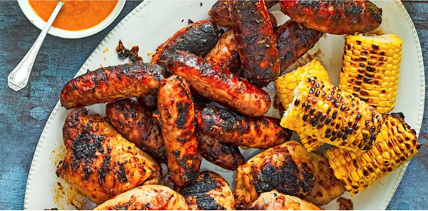 Barbecued chicken and sausages with a Carolina mustard BBQ sauce