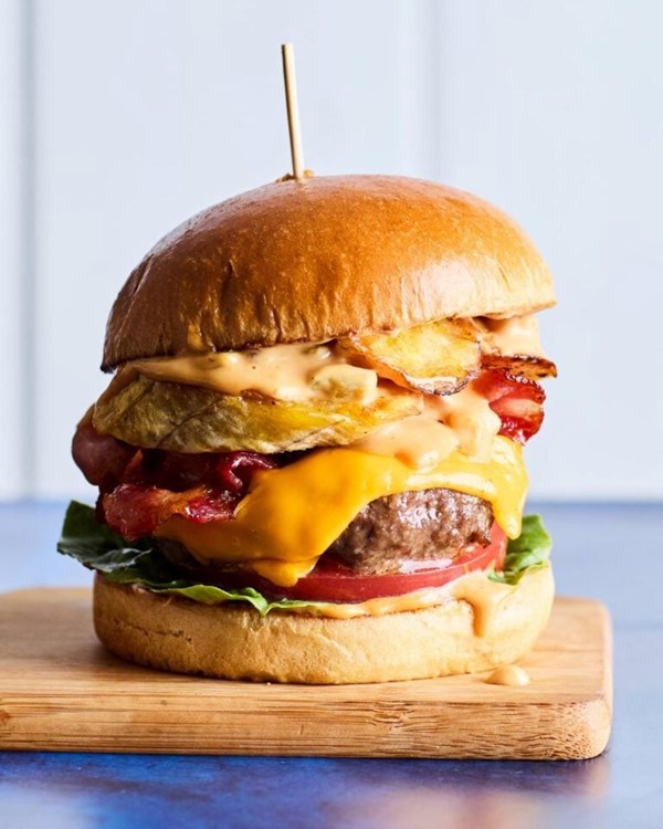 Barbecued chorizo burger with pickled walnut romesco and Manchego melt