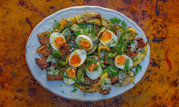 Barbecued courgette and bread salad with dill and chilli flakes, soft boiled eggs, anchovy, garlic and parsley dressing