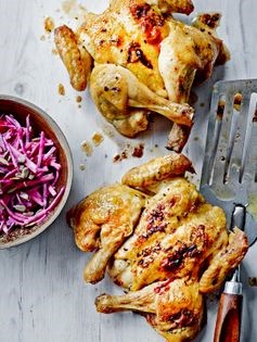 Barbecued garlic & thyme spatchcock poussin with celeriac, beetroot & sunflower seed coleslaw