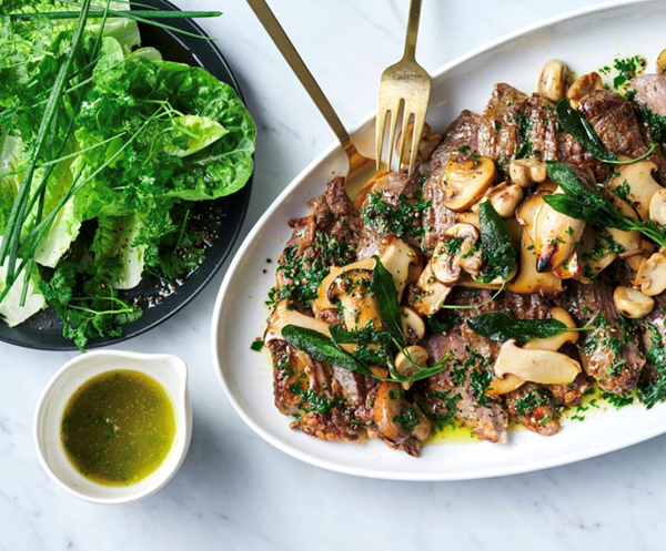 Barbecued hanger steak with cacio e pepe mushrooms