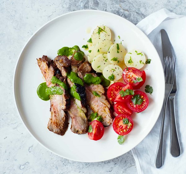 Barbecued leg of lamb with coriander salsa