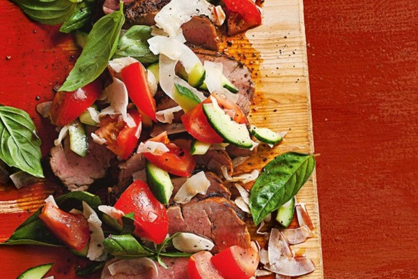 Barbecued pork fillet with coconut, cucumber & tomato salad