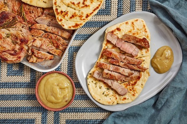  Barbecued pork shoulder steaks with smoked apple sauce and rosemary flatbreads