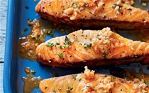 Barbecued salmon steaks with spicy shrimp butter
