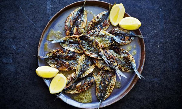 Barbecued sardines with parsley, roast garlic and lemon butter